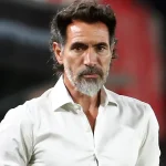 Atlético Mineiro head coach Eduardo Domínguez looking on attentively from the sidelines during a match.