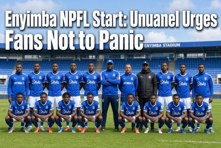 Enyimba FC players and coaches posing for a team photo on the pitch in blue kits ahead of the NPFL season