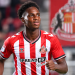 Trey Ogunsuyi in a Sunderland shirt during his football development